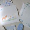Deer Moss Mail Club monthly envelope with illustrated postcard